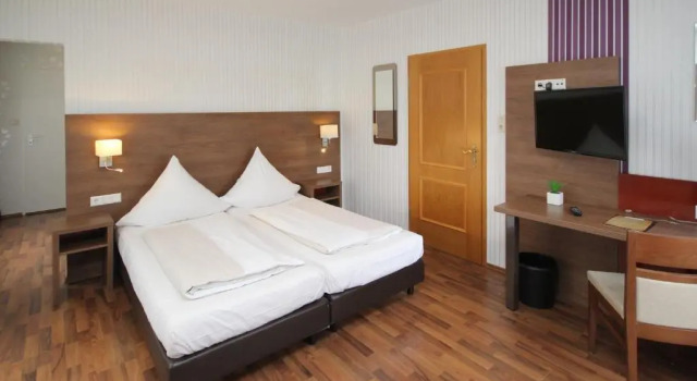 Четырёхместный номер Standard Hotel Berghof Wasserkuppe und Gästehaus Fuldaquelle