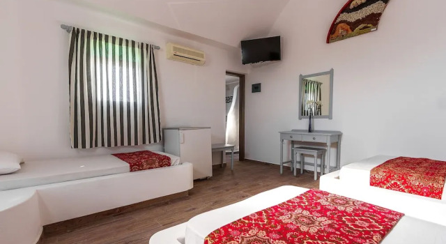 Четырёхместный номер Superior Villa Iliovasilema Santorini
