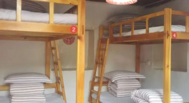 Кровать в общем номере Dali Nuodeng Lvwo International Youth Hostel