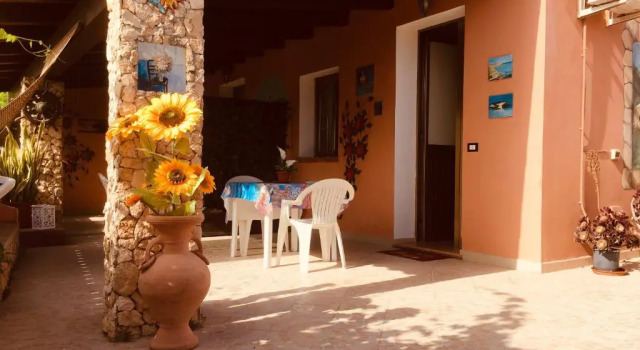 Апартаменты A due passi da Cala Pisana