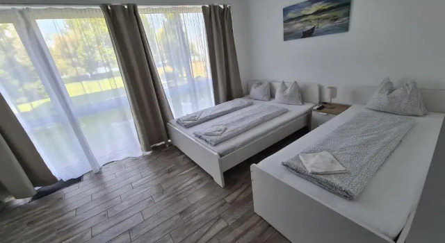 Апартаменты Цокольный этаж Surman Apartmanok