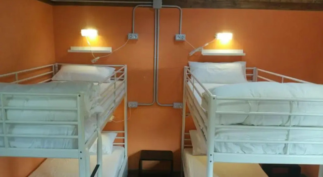 Кровать в общем номере O Albergue