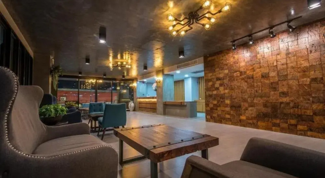 Кровать в общем номере deVloft hotel Korat