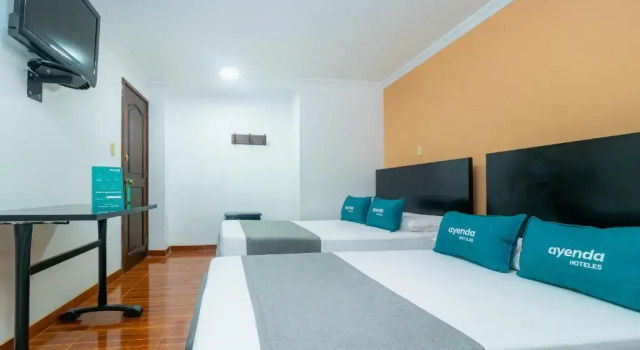 Четырёхместный номер Standard Hotel Ayenda Normandy