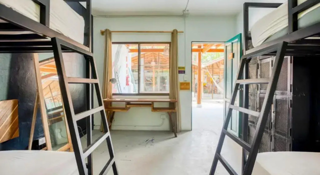 Кровать в общем номере Armonia Santa Teresa