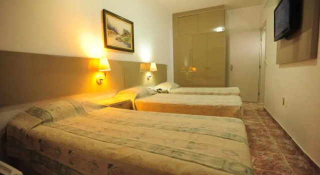 Четырёхместный номер Standard Ideal Praia Hotel