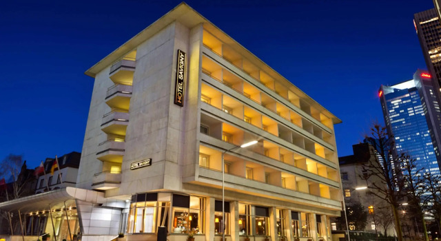 Кровать в общем номере Savigny Hotel Frankfurt City Messe