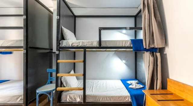 Кровать в общем номере Sparta Team Hotel