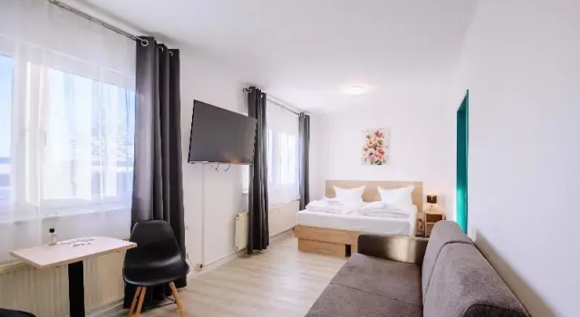 Четырёхместный семейный номер Standard REGIOHOTEL Halle Leipzig Airport