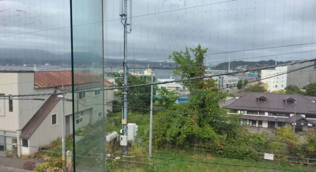 Кровать в общем номере с видом на окрестности World Inn Muroran Nakamano-Ie! Noboribetsu, Toyako, Sapporo, and Airport Direct Bus Stop