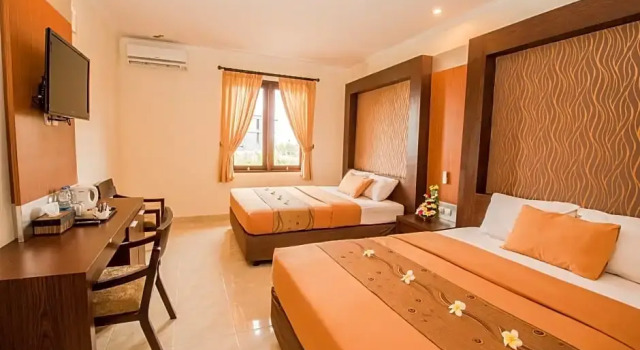 Номер Deluxe Hotel Puri Nusa Indah