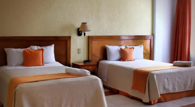 Трёхместный номер Standard Hotel Báez Carrizal