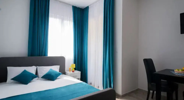 Двухместная студия с видом на сад Apartments Sunrise