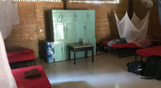Кровать в общем номере Cocohuts Cambodia