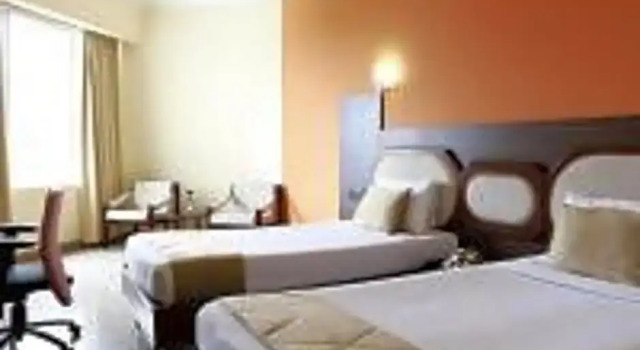 Номер Deluxe Presidency Kochi City Centre