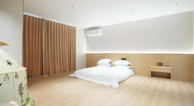 Семейный люкс с 2 комнатами Jiujiang Guangsha Hanshe Apartment (Nanshan Park)