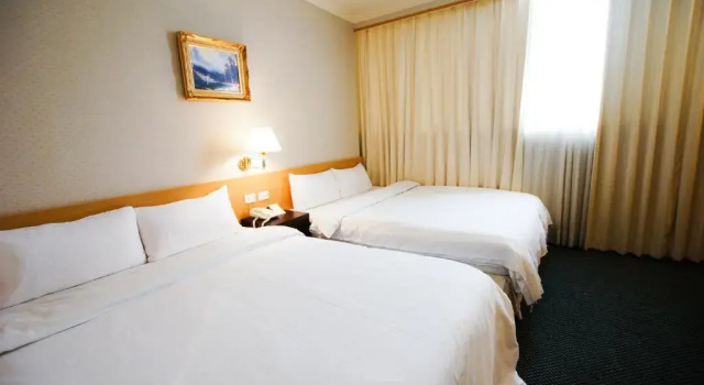 Четырёхместный номер Cambridge Hotel - Yung Kang