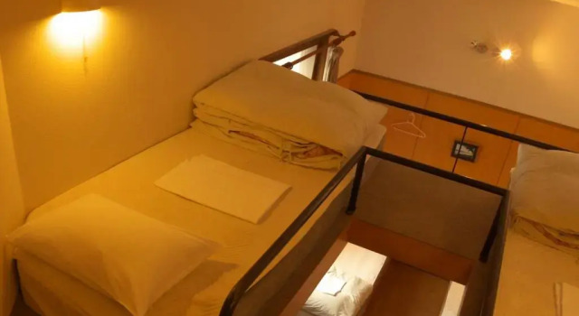 Кровать в общем номере (мужской номер) Kussharo Genya Youth Guesthouse
