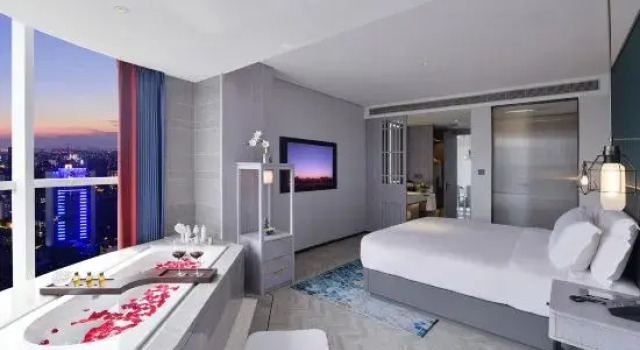Четырёхместный семейный люкс Отель Chengdu Tianfu Plaza Mehood Elgant