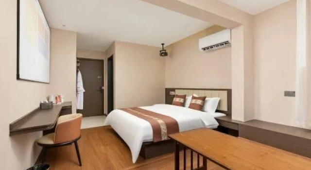 Кровать в общем номере Taoxi Homestay
