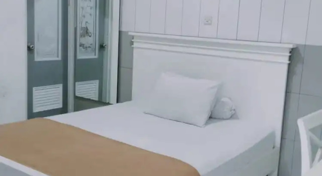 Трёхместный номер Deluxe Ratu Guesthouse