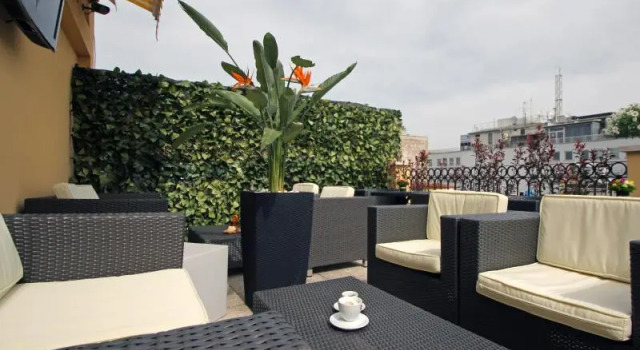 Кровать в общем номере Hotel Indipendenza