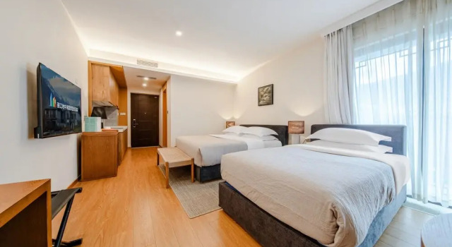 Двухместный семейный номер Standard с балконом Joy Holiday Lijiang Hotel
