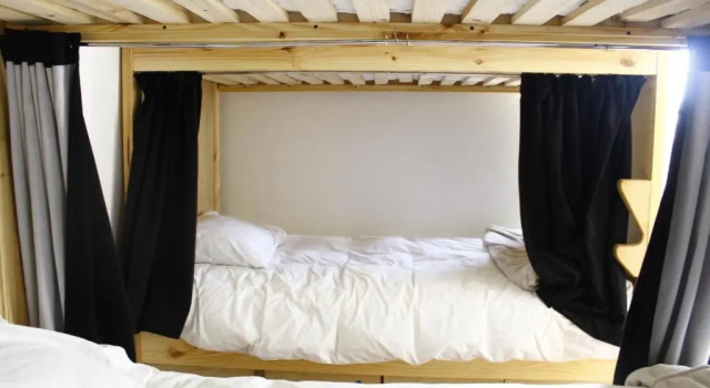 Кровать в общем номере Casa Kila Hostel