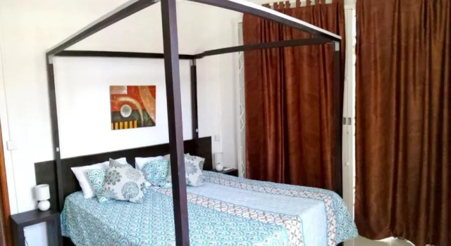 One bedroom appartement at Pereybere 500 m away from the beach with shared pool enclosed garden and wifi