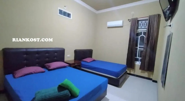 Habitación familiar Estándar Rian Kost - Hotel Penginapan Murah Pusat Kota Palembang