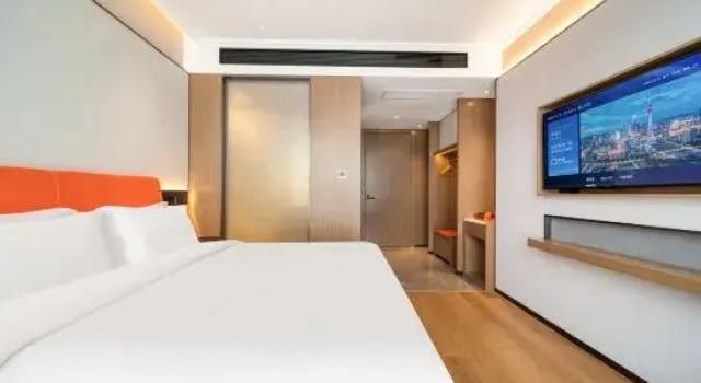 Кровать в общем номере Duoxi Road Hotel