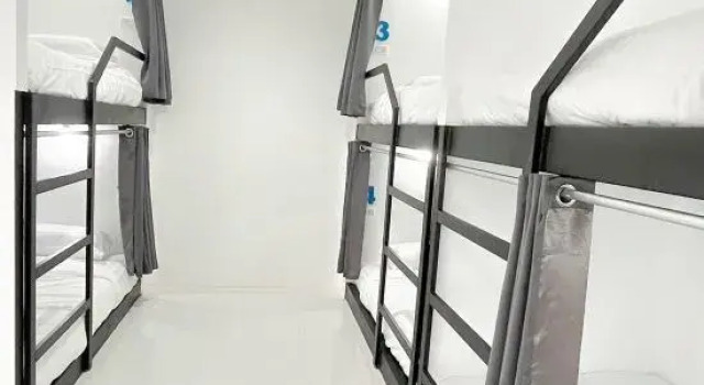 Кровать в общем номере Krabi Grand Place Hotel