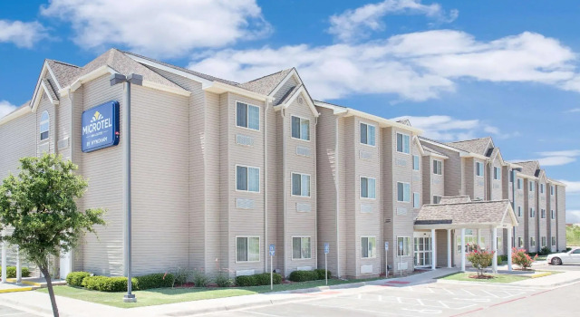 Кровать в общем номере Microtel Inn & Suites by Wyndham San Angelo