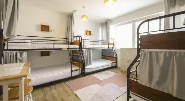 Кровать в общем номере SUM Guesthouse Jeju Airport