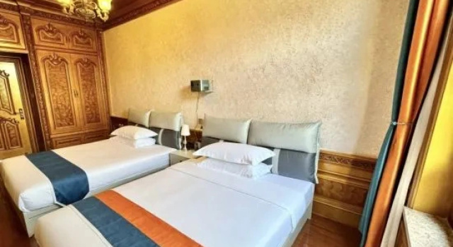 Семейный люкс Deluxe с 2 комнатами Jianglai Homestay