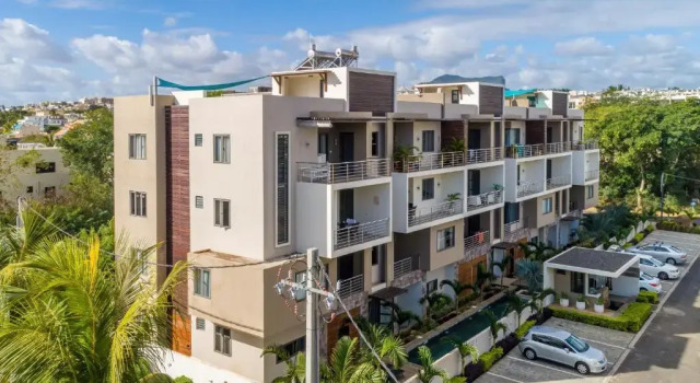 Апартаменты West Wood Holiday Apartment, C6 - Flic en Flac with pool at a quiet location, beautifully decorated and close to the beach