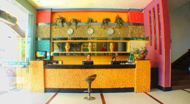 Dan Zhou Xin Bao Lai Holiday Hotel, Book Hotel Danzhou Hainan