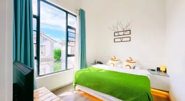Двухместный люкс Dali Zuoshe Courtyard Homestay