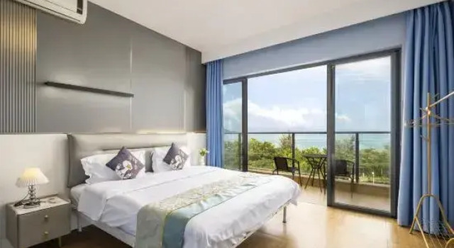 Семейный люкс с 3 комнатами с балконом и с видом на море Jiuqi Sanya iHome Seaview Design Homestay (Sanya Bay Coconut Dream Corridor Store)
