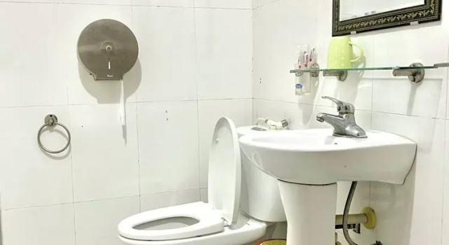 Кровать в общем номере Tuan Ngoc Hotel