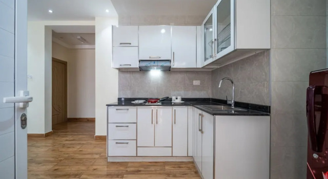 Апартаменты OYO Townhouse 156 Rose Hotel Apartments.