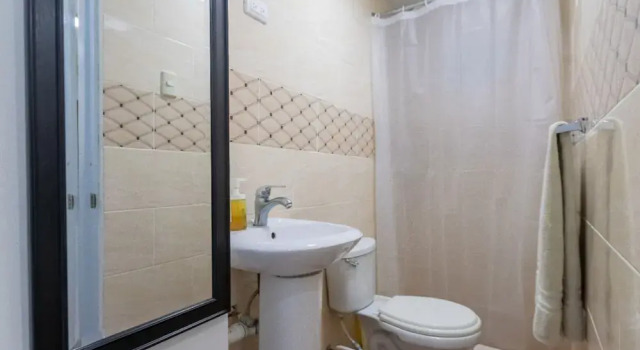 Кровать в общем номере Nice 1br-1bt With Common Picuzzi