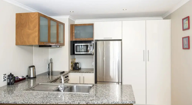 Апартаменты с 3 комнатами с красивым видом из окна The Reef Beachfront Apartments