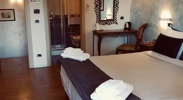 Номер Luxury Aurelia Garden Gold B&B