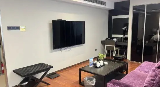 Номер Economy Qingdao Housing International Hotel