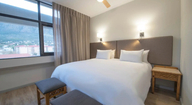 Апартаменты Deluxe Gardens Centre Holiday Apartments