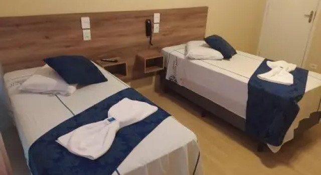 OYO 105 Guaru Plaza Hotel