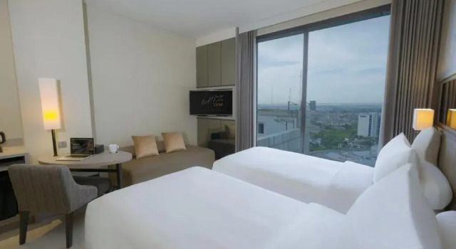 Deluxe Twin room Whiz Luxe Hotel Spazio Surabaya