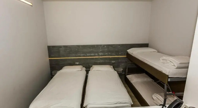 Кровать в общем номере Campione Univela Hostel