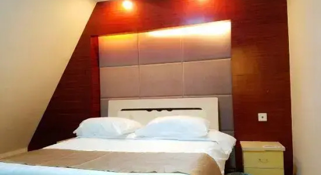 Семейный люкс с 2 комнатами Platinum Apartment (Dalian Jinshitan Discovery Kingdom Light Rail Station)